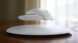 Illustration for article titled Is this hovering computer mouse real or fake?